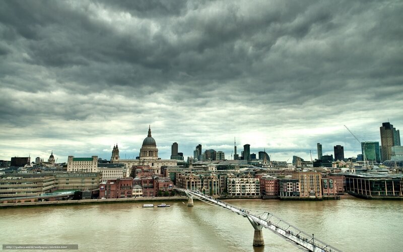 London skyline under stormy sky