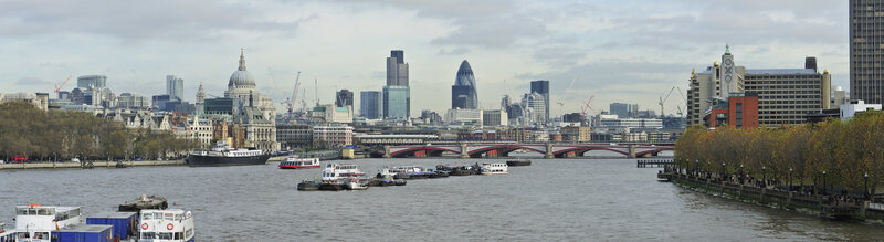 London skyline with river and boats
