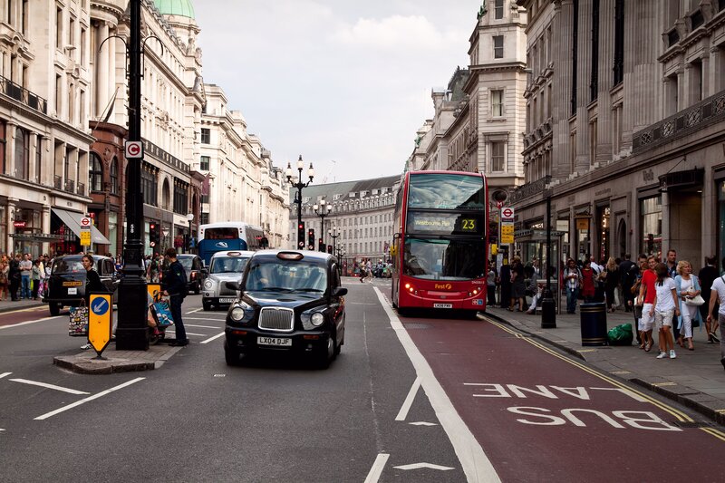 London street scene with buses and taxis