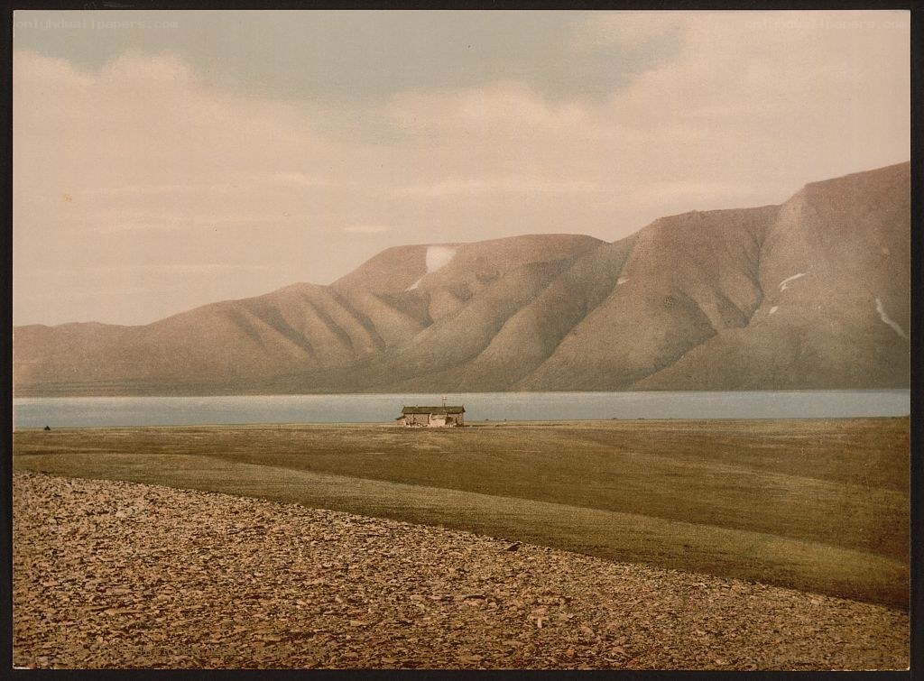 Lone cabin by a lake