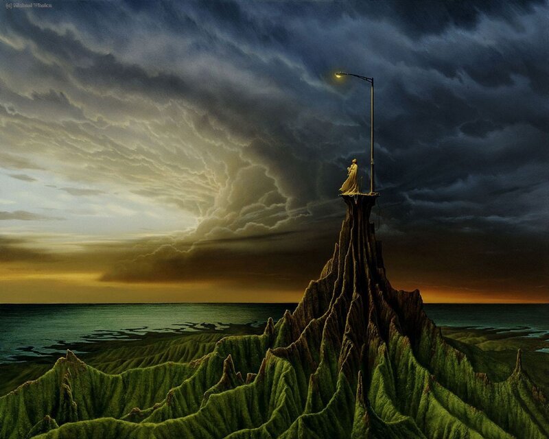 Lone figure on a cliff at dusk