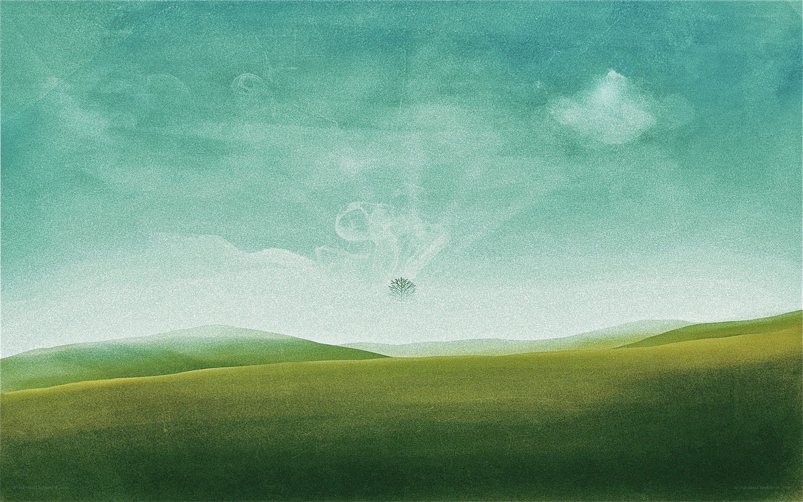 Lone tree on rolling hills