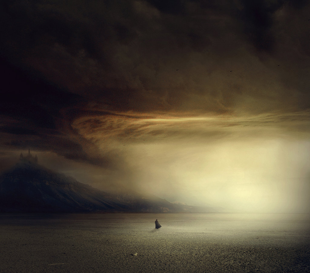 lonely figure in desolate landscape