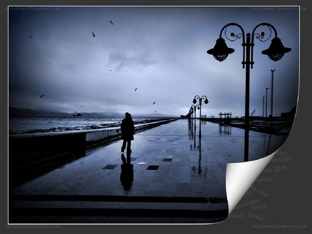 lonely figure on pier