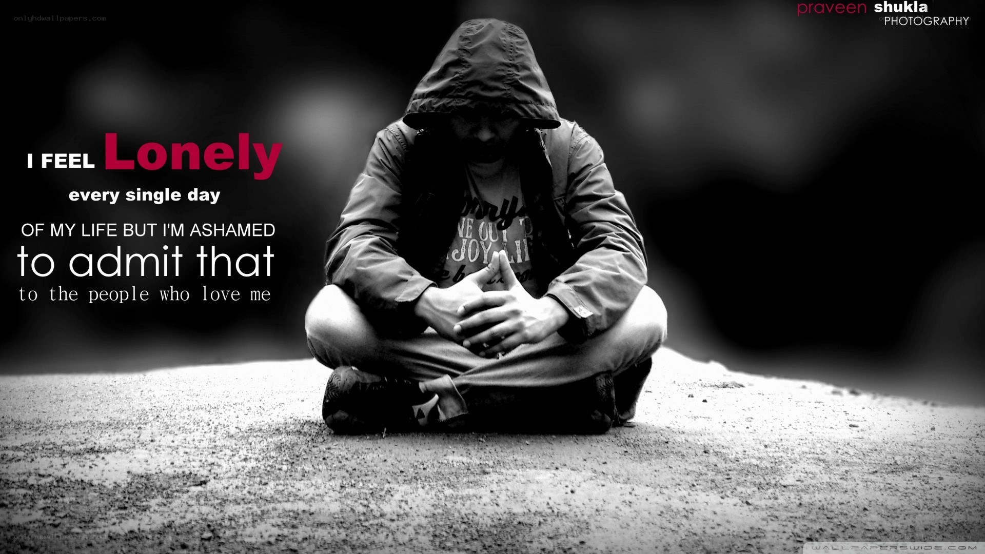 lonely man in hood