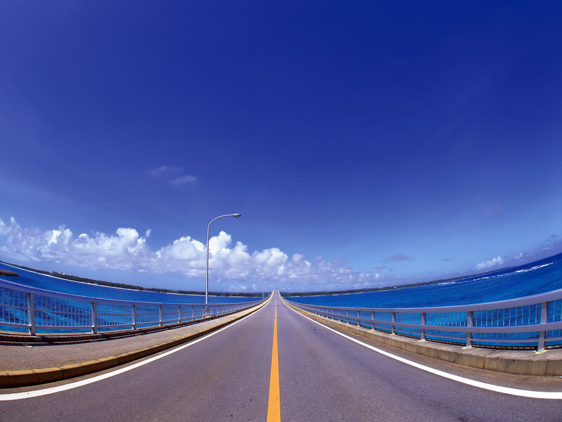 Long bridge over blue ocean