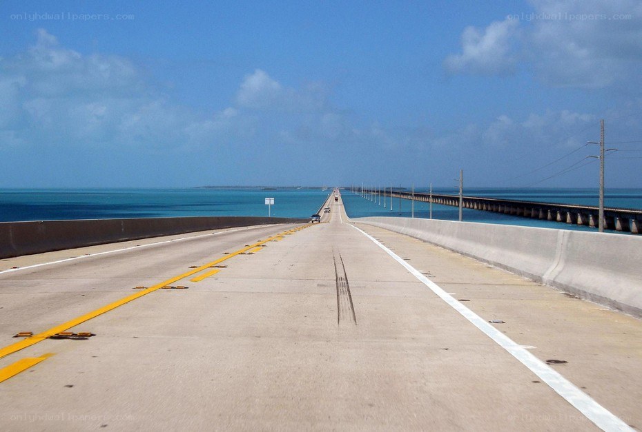 long bridge over blue water