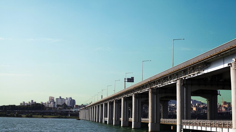 Long Bridge over River — Blue