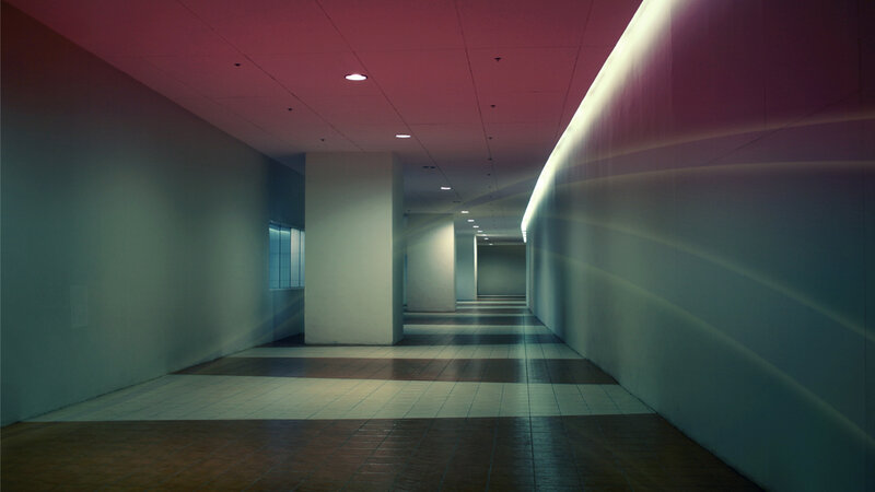 long hallway with colored lighting