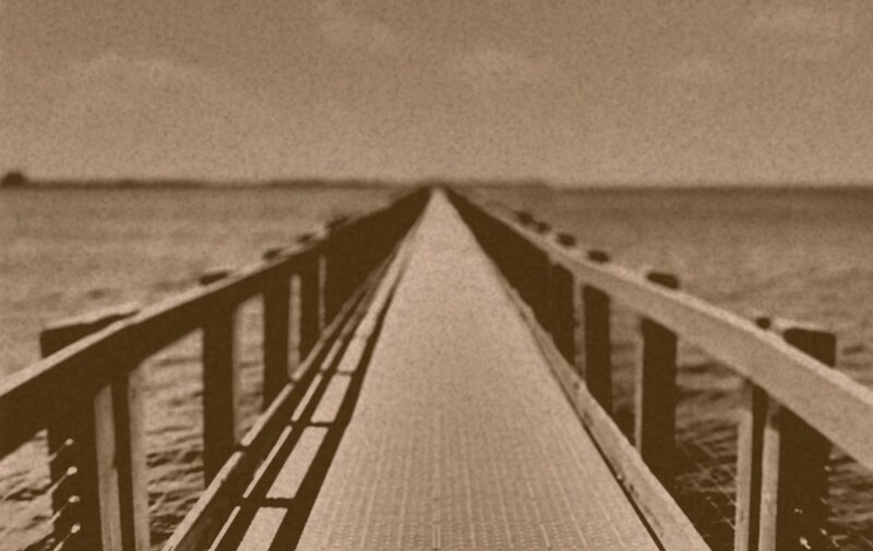 long pier extending into the sea