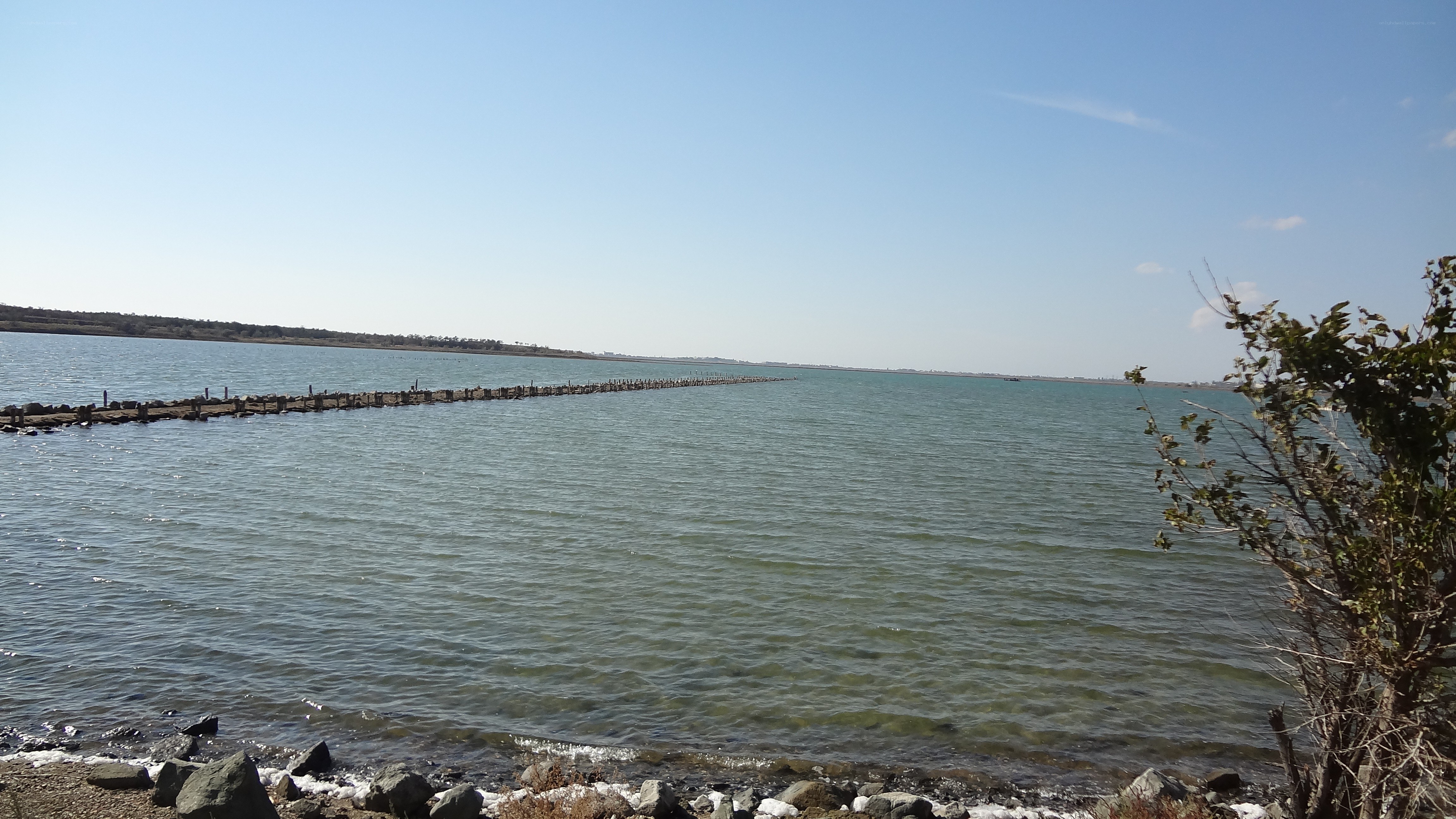 Long pier on a calm lake