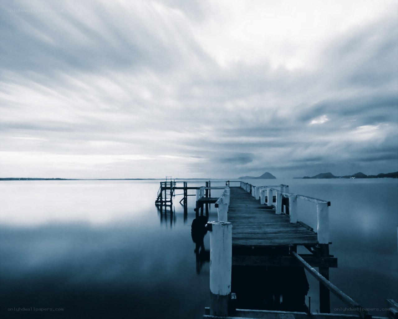 Long pier over calm water