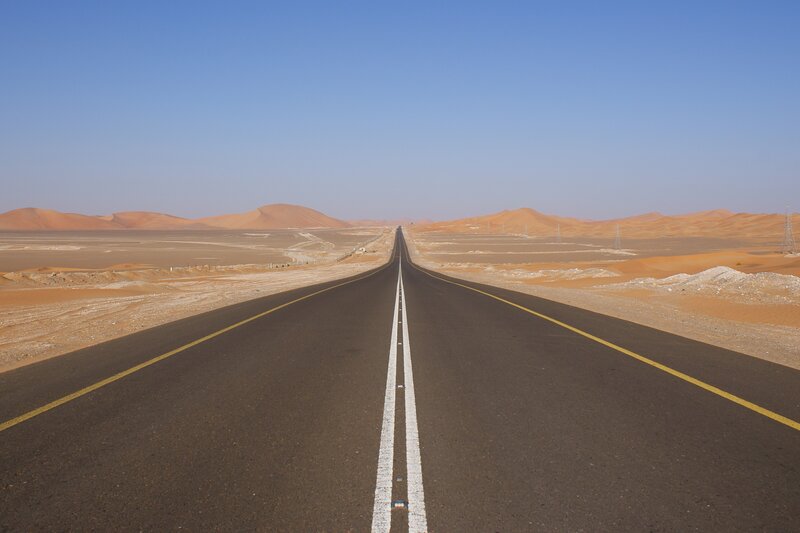 Long Road in Desert — Blue, Serene, Afternoon, Photograph, Sand Dunes