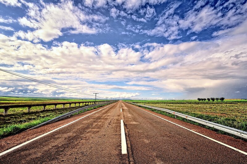 Long Road in Flat Landscape — Blue
