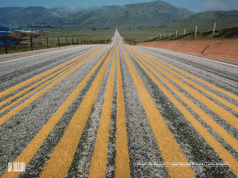 Long road stretching to mountains