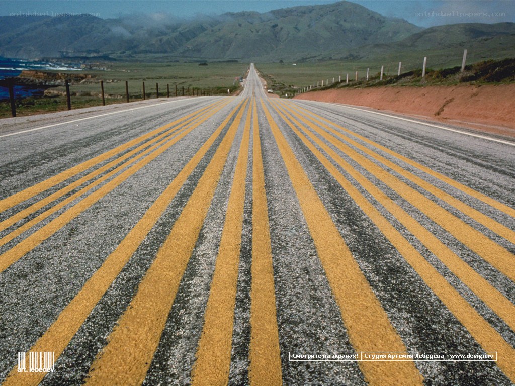 Long road stretching to mountains