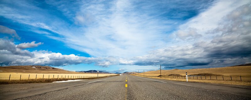 Long road through open plains