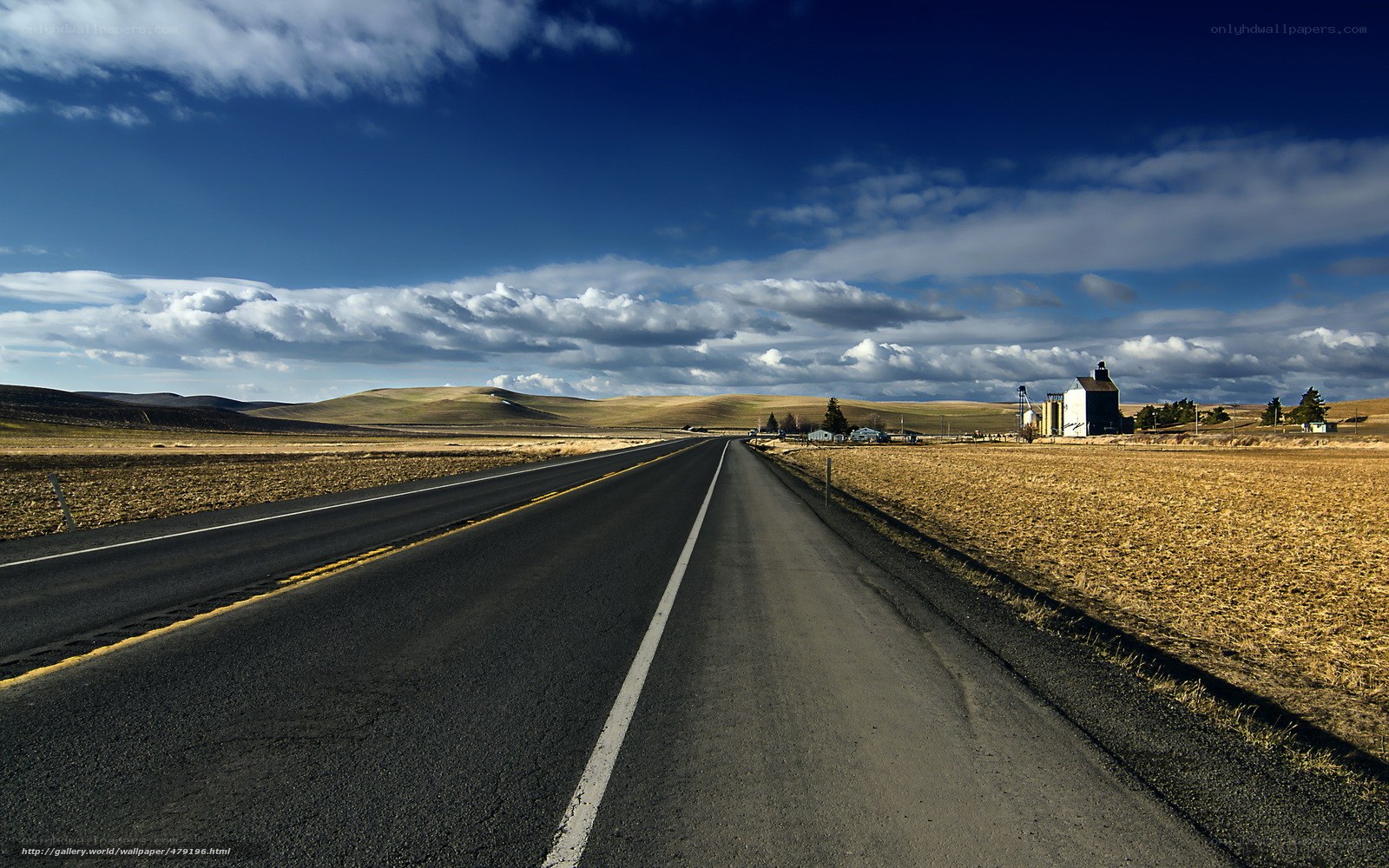 Long road through rural landscape