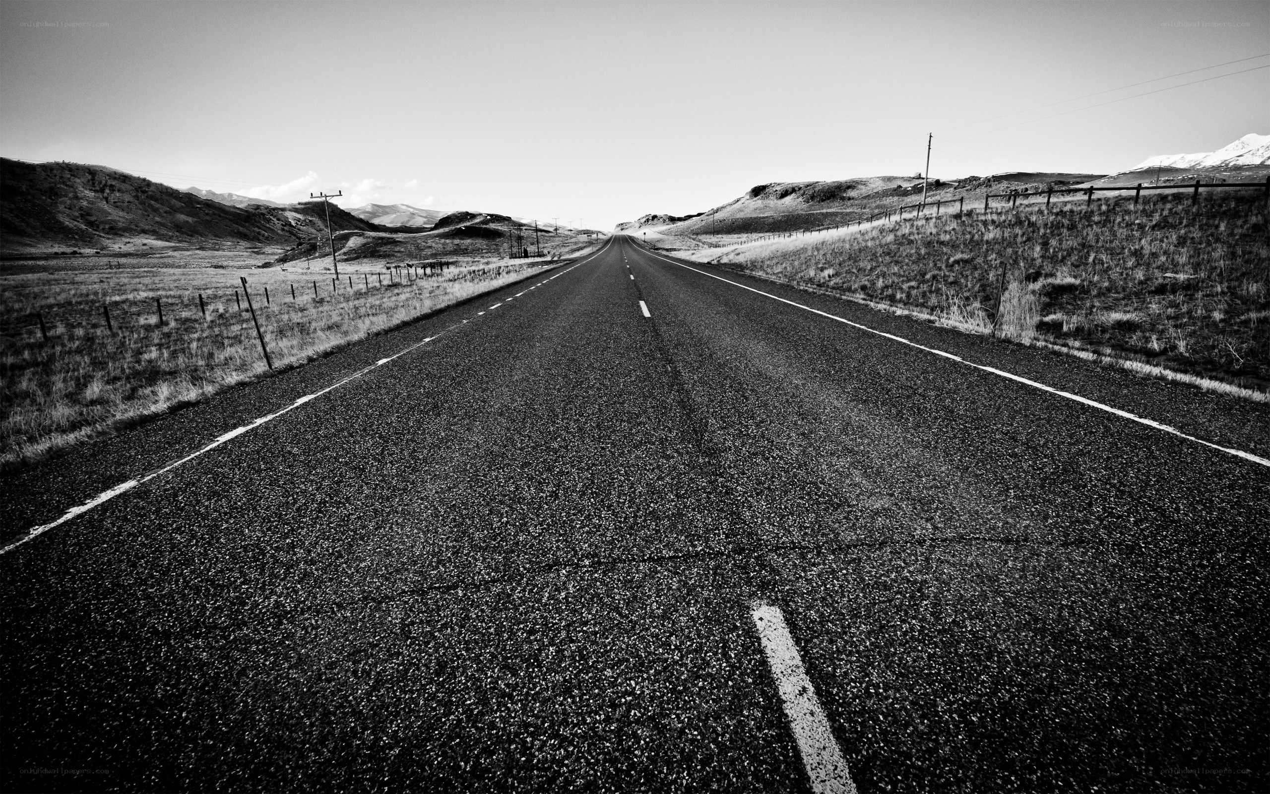 Long road through rural landscape