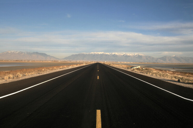 Long road to snow-capped mountains