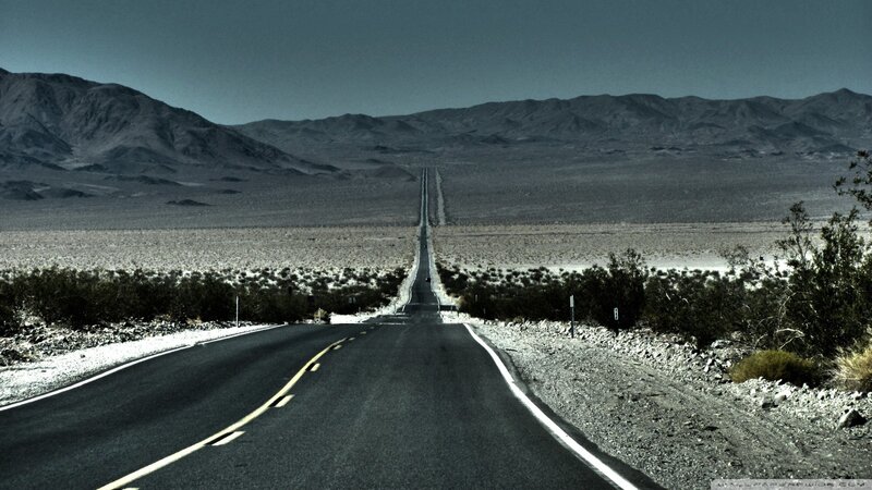 Long Straight Road in Desert