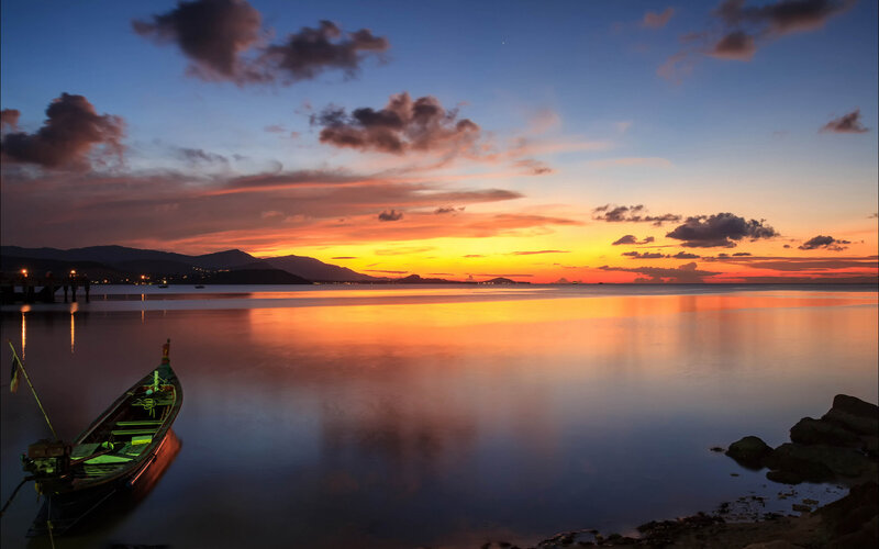 Long-tail Boat at Sunset — Orange, Serene