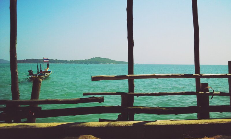 Long-tail Boat in Sea