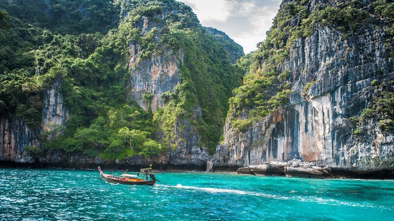Long-tail Boat in Turquoise Water — Blue, Serene