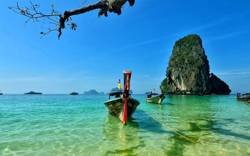 Long-tail Boat in Turquoise Water
