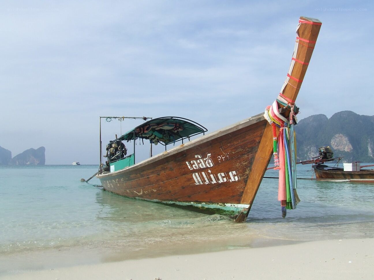 Long-tail boat on a tropical beach
