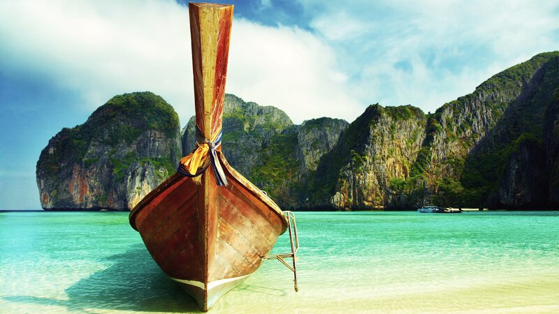 Long-tail Boat on Beach — Blue, Serene, Afternoon, Photograph, Cliffs, Sea, Green