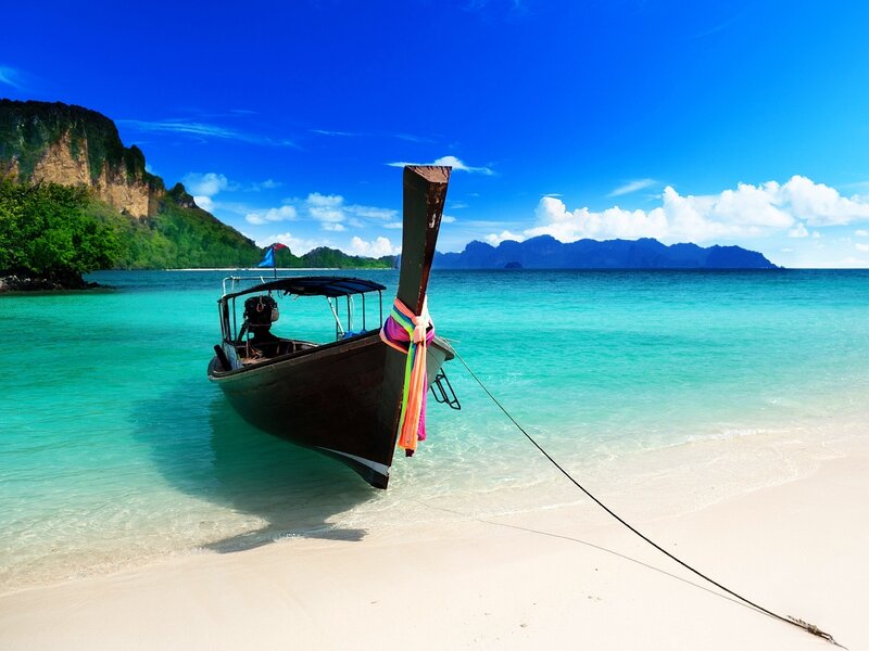 Long-tail Boat on Beach — Blue, Serene, Afternoon