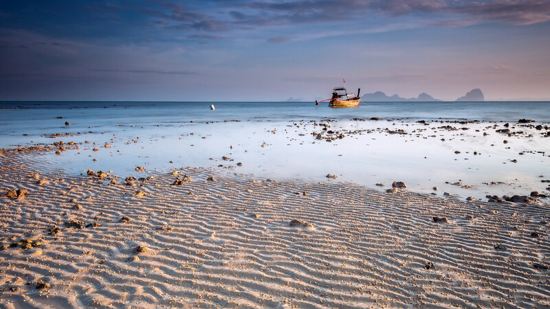 Long-tail Boat on Beach — Blue, Serene, Sunset