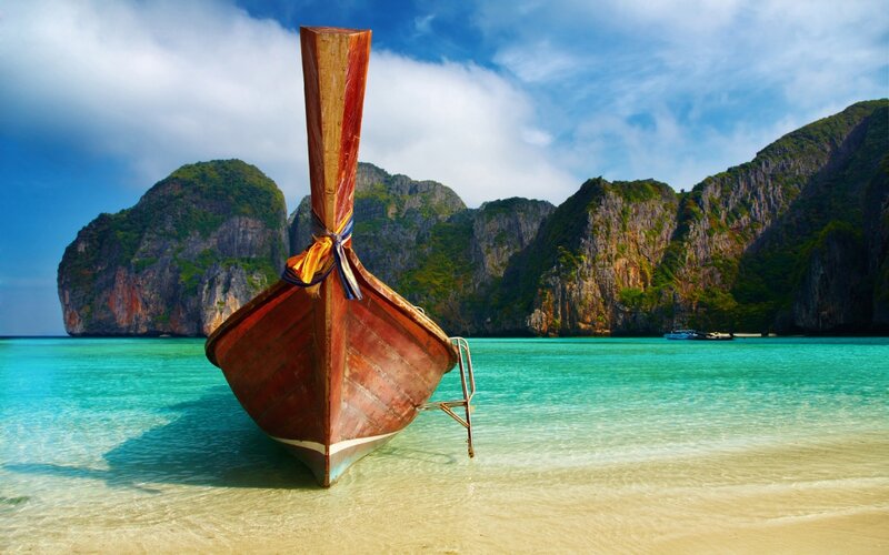 Long-tail Boat on Beach — Blue, Serene