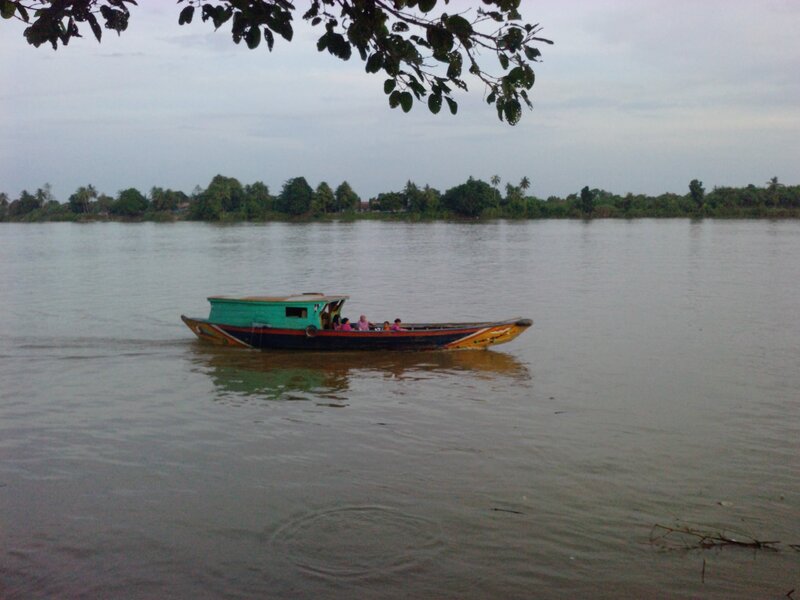 Long-tail Boat on River