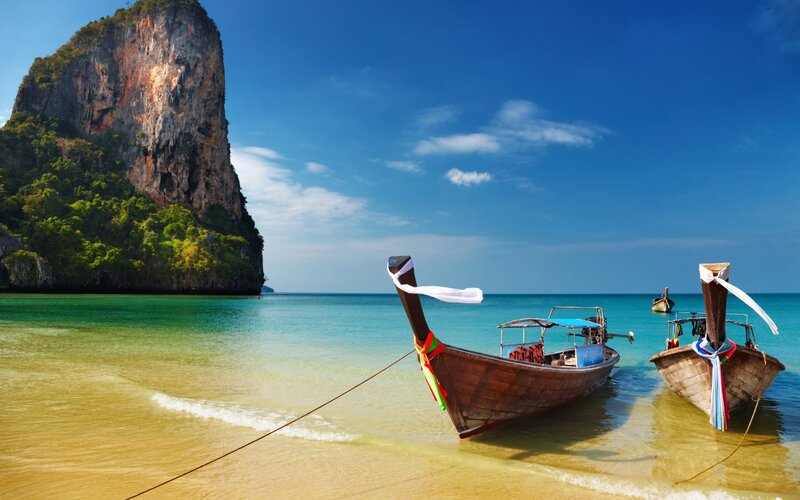 Long-tail Boats on Beach — Blue
