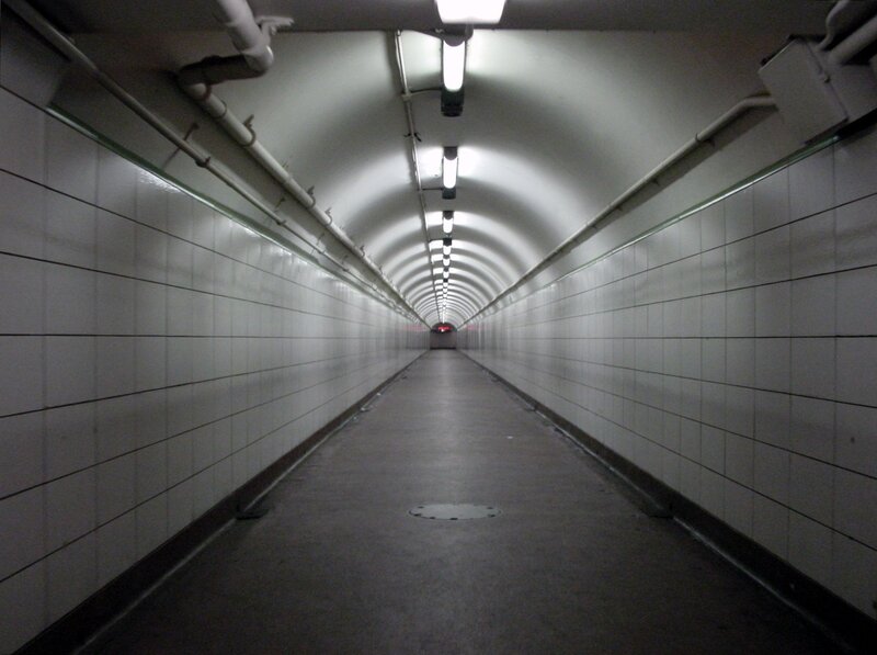 long tiled tunnel corridor