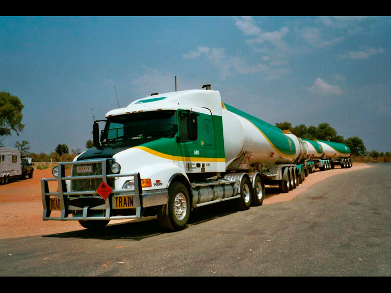 Long truck convoy on a road