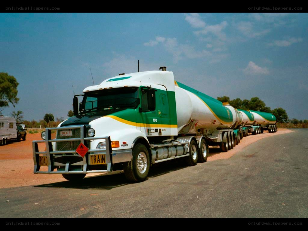 Long truck convoy on a road
