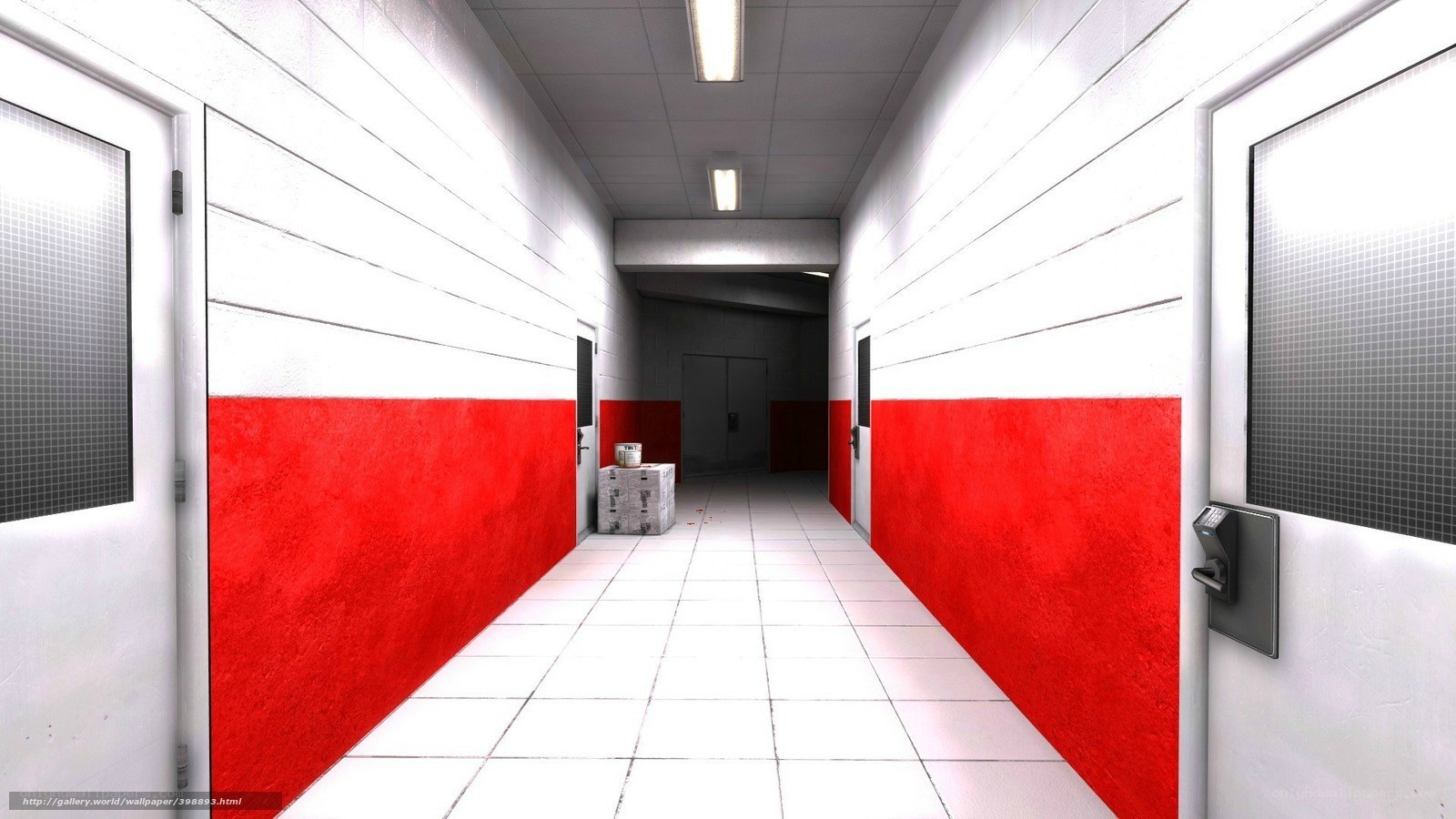 long white corridor with red walls
