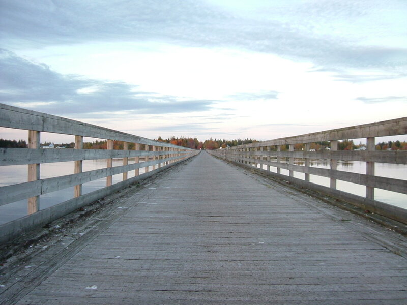 Long wooden bridge over water