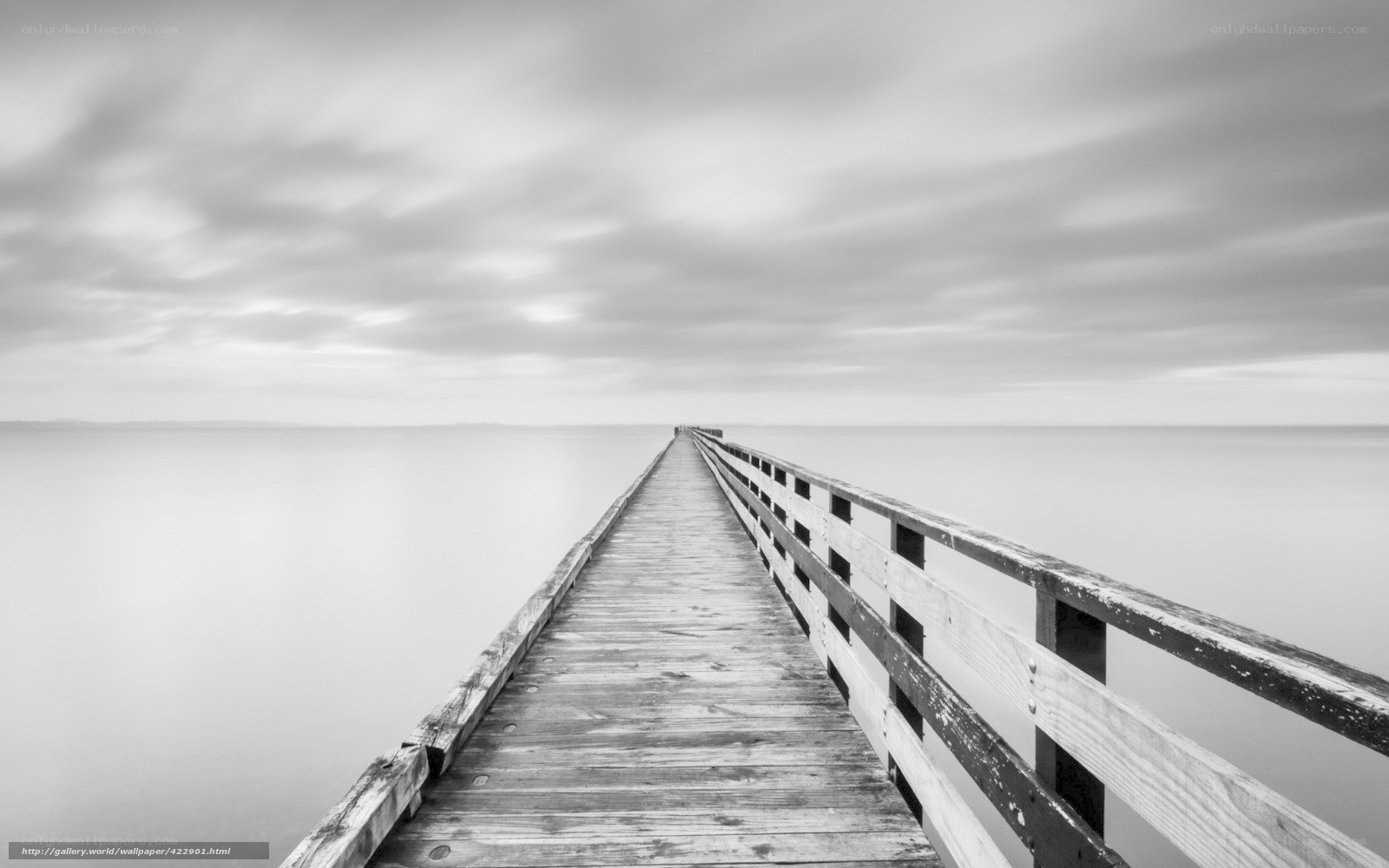 Long wooden pier at sea