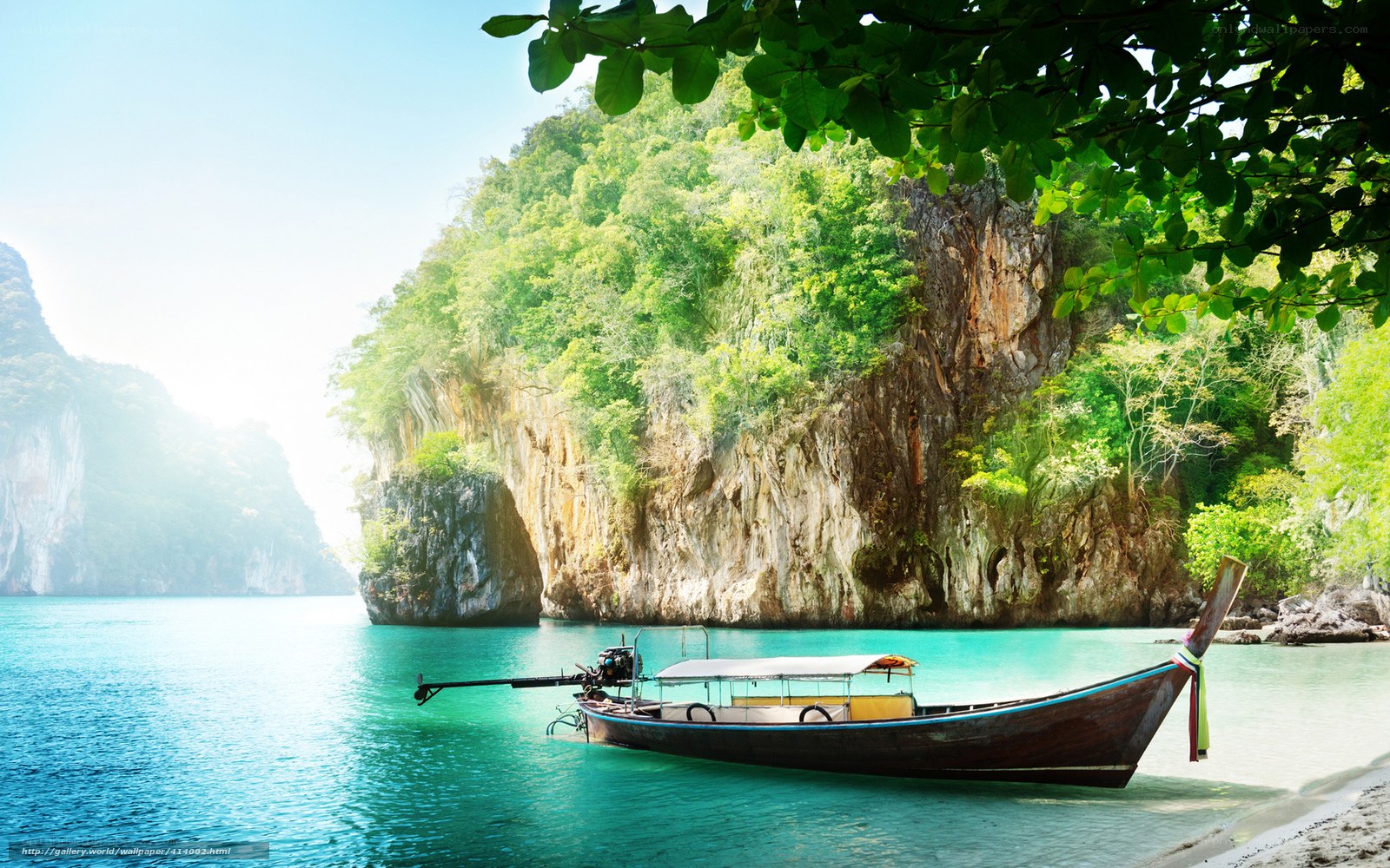 Longtail boat at tropical cove