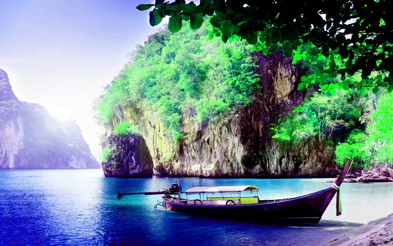 Longtail Boat in Bay — Blue