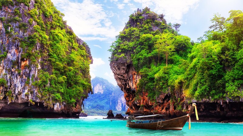 Longtail Boat in Bay — Green, Serene, Afternoon