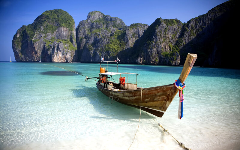 Longtail Boat in Bay