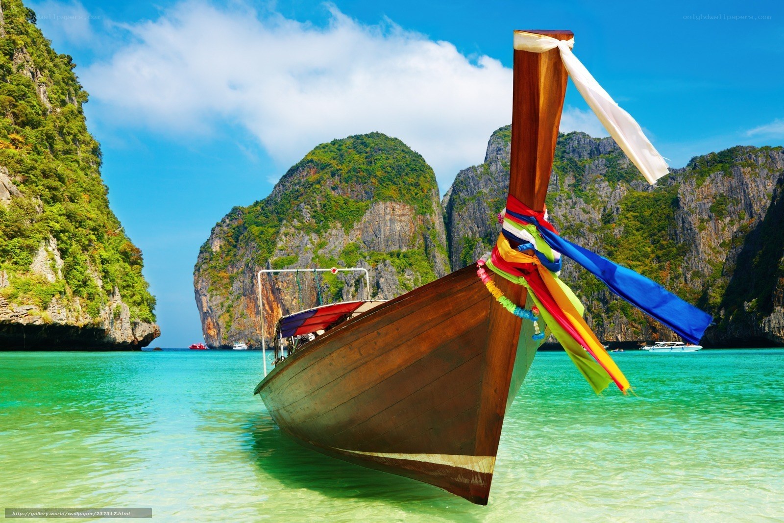 Longtail boat in tropical bay