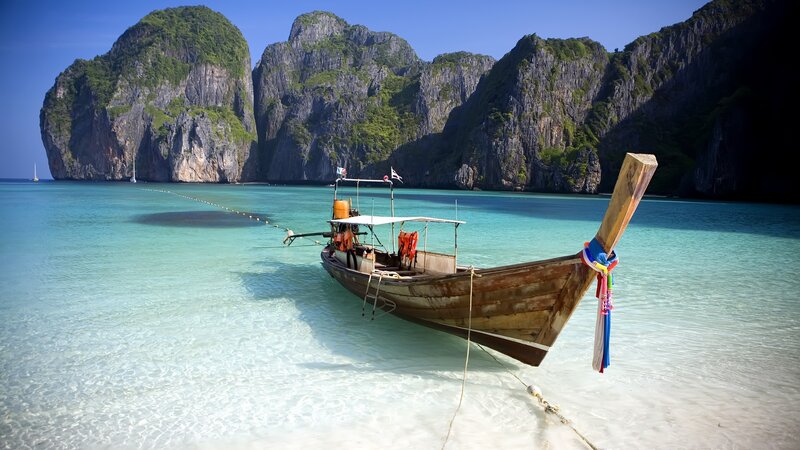 Longtail Boat in Turquoise Water — Blue, Serene, Afternoon, Photograph, Cliffs, Sea
