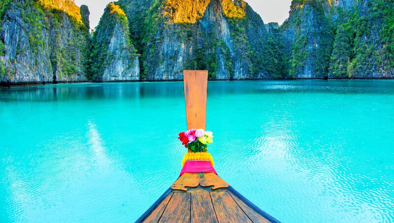 Longtail Boat in Turquoise Water — Serene