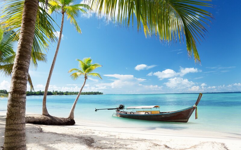 Longtail Boat on Beach — Blue, Serene, Afternoon, Photograph, Palm Trees, Ocean, Sky